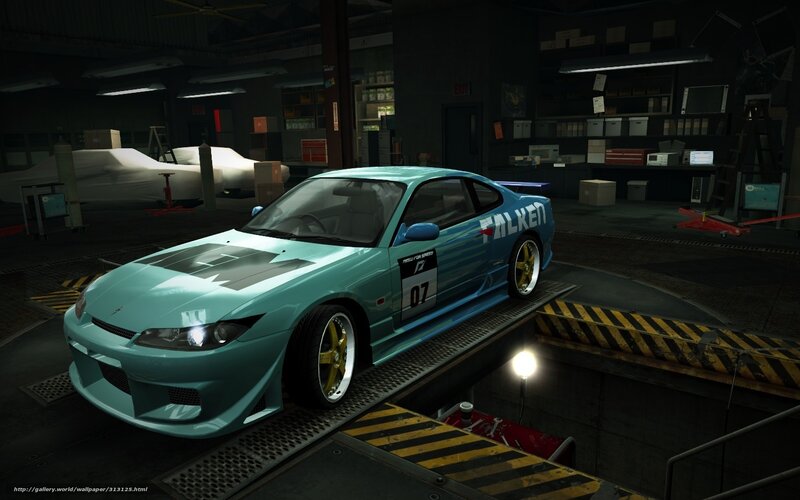 teal race car in garage