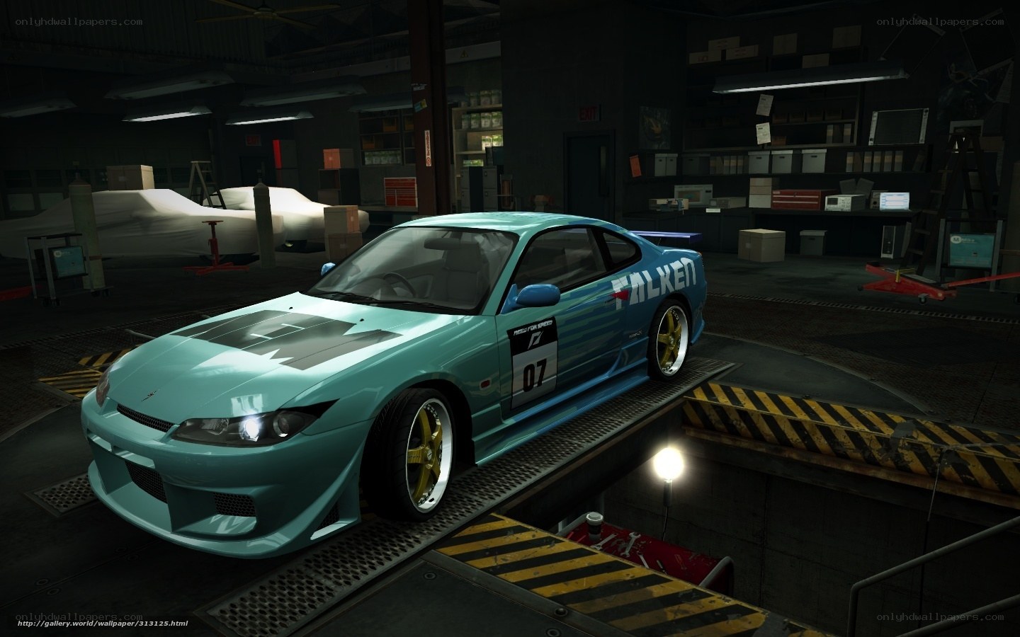 teal race car in garage