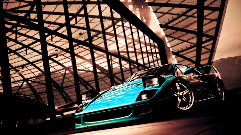teal sports car in garage