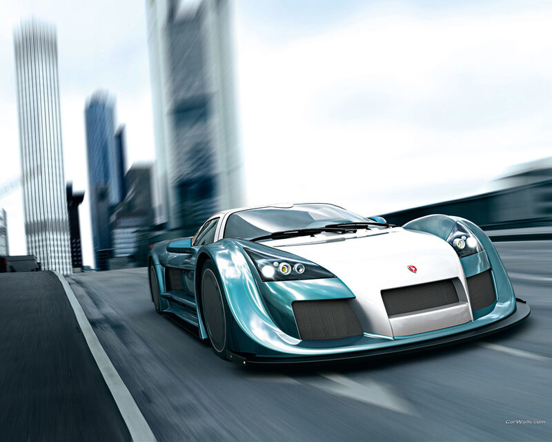 Teal sports car in motion
