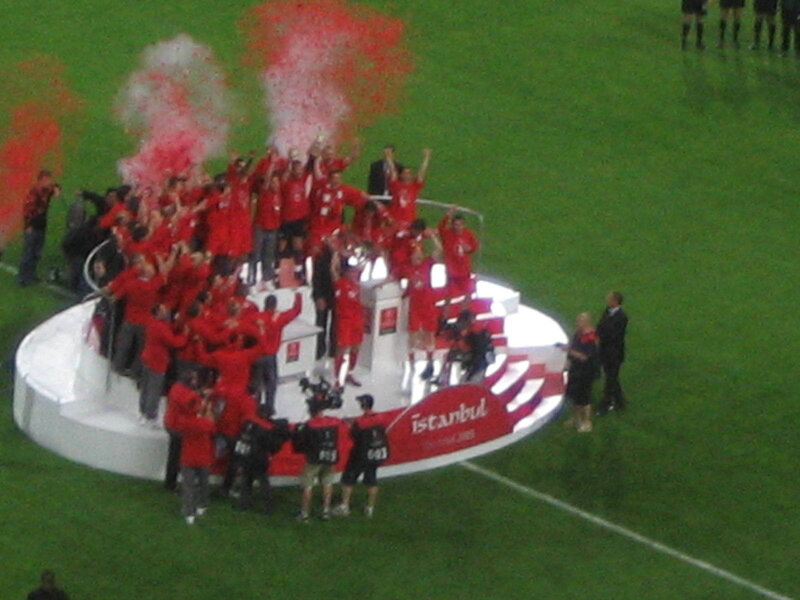 team celebrating on podium