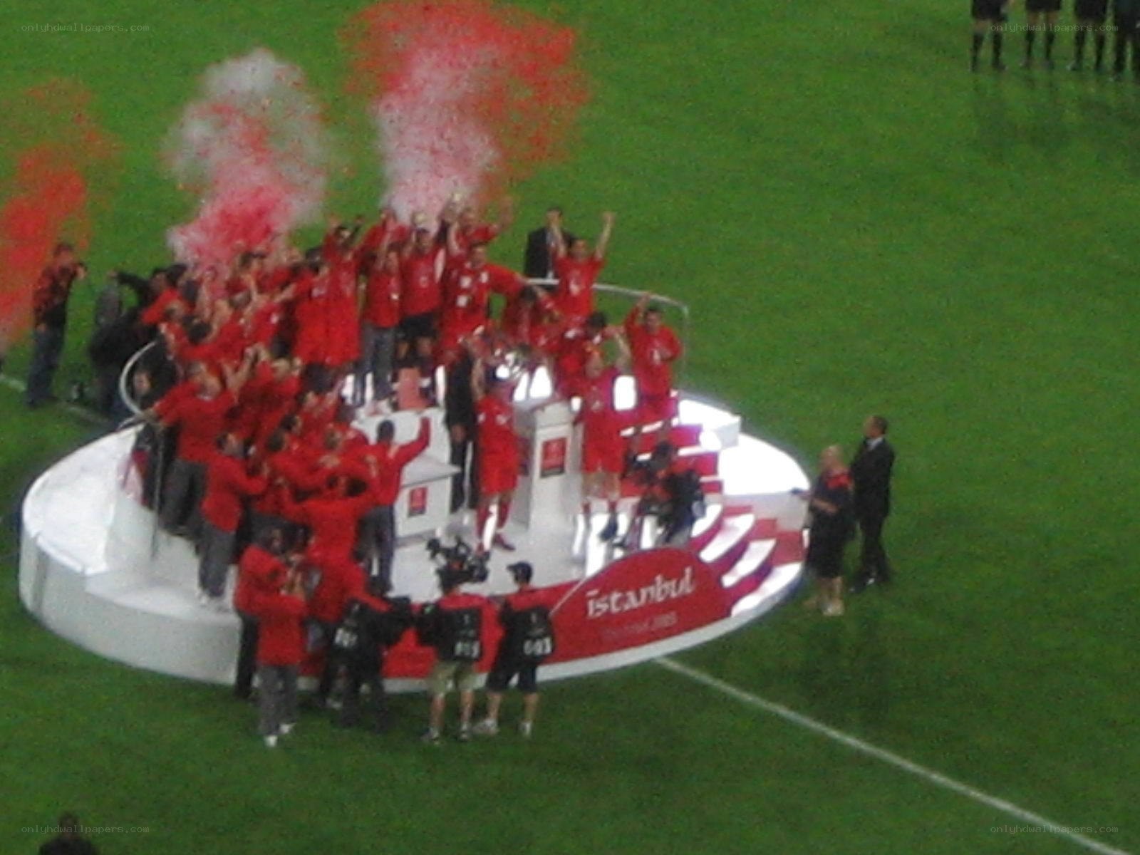 team celebrating on podium