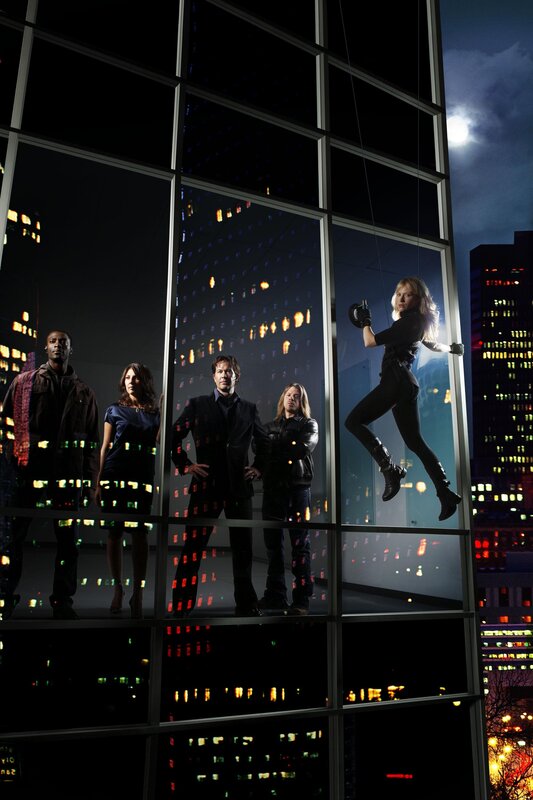 Team on a city building facade