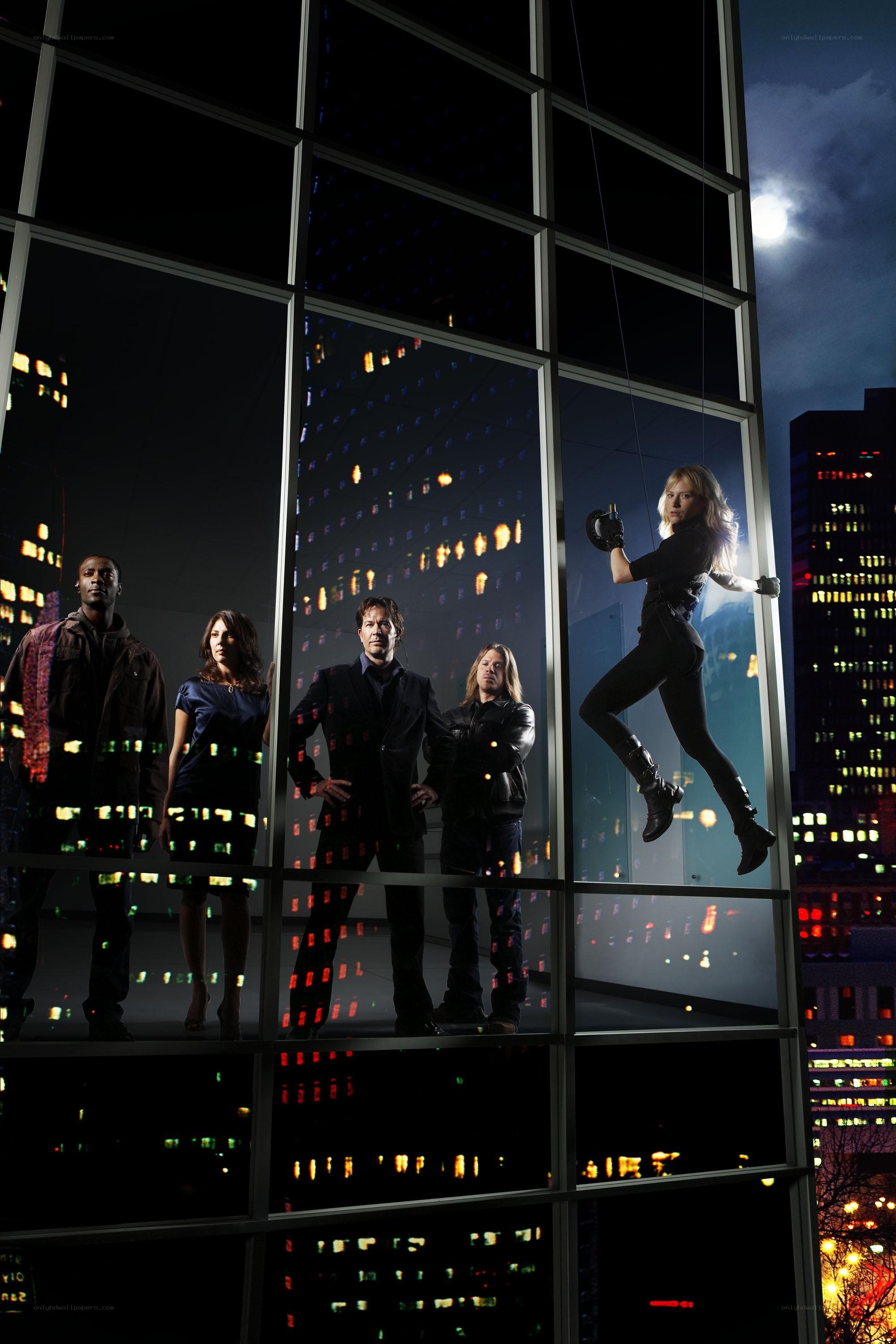 Team on a city building facade