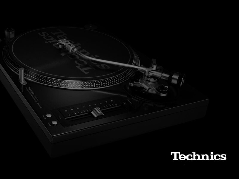 Technics turntable on black background