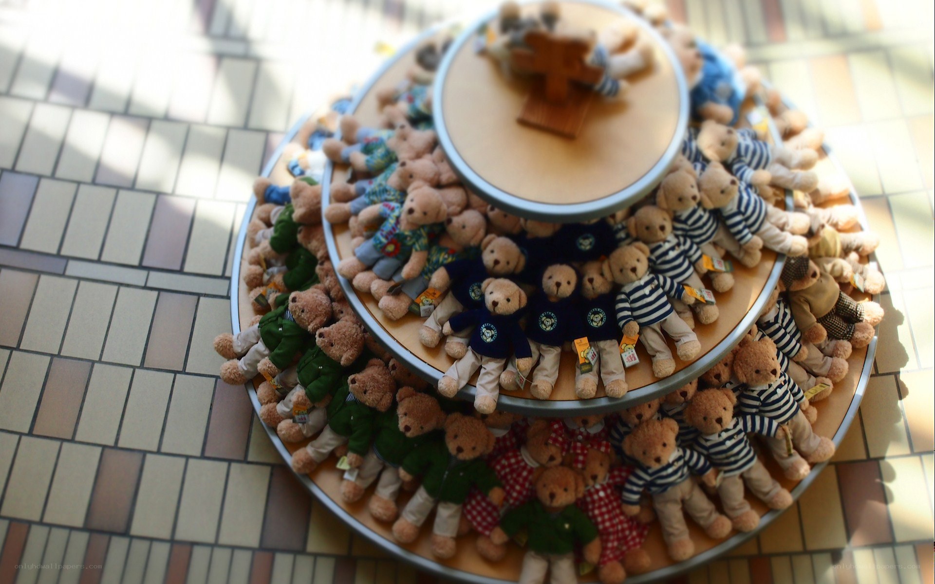 Teddy bear display on tiered stand