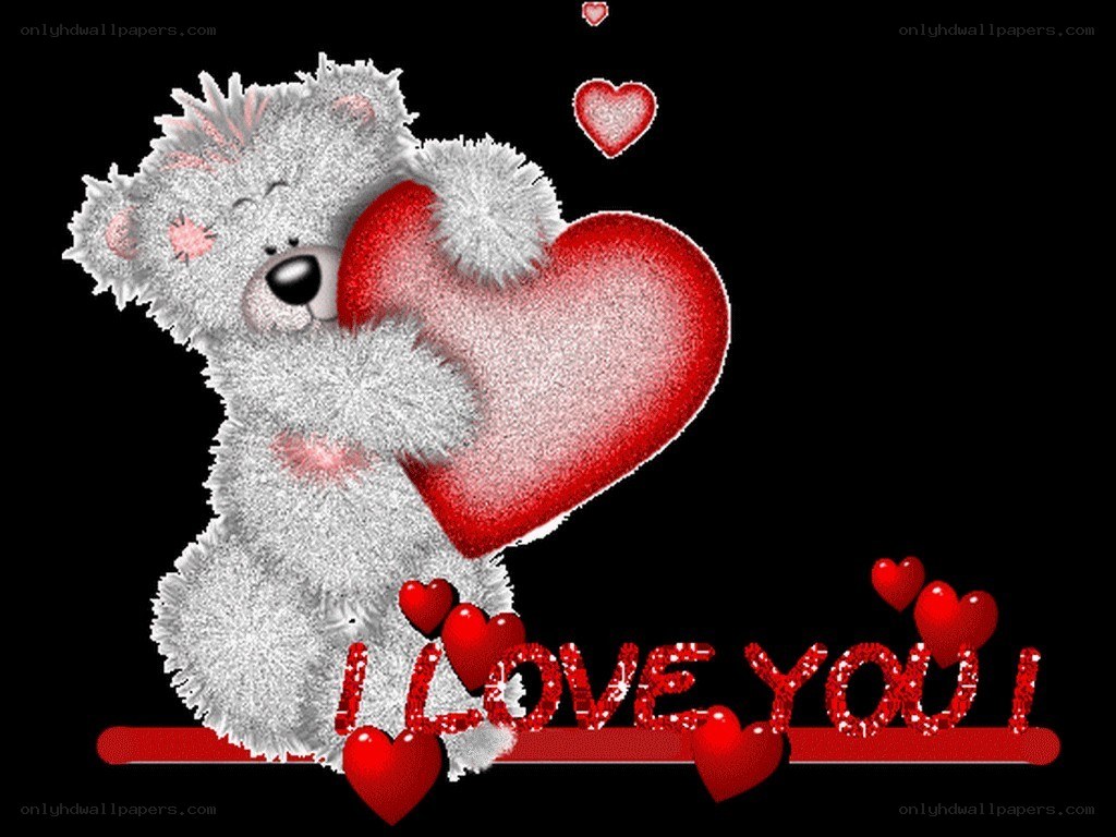 teddy bear holding heart