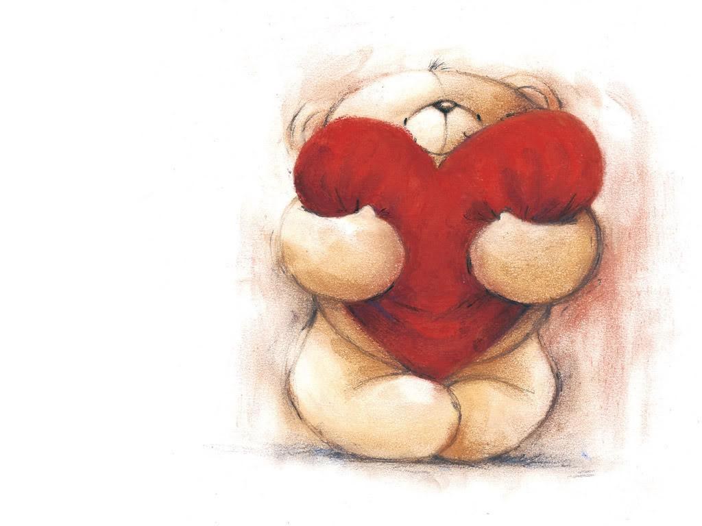 teddy bear holding heart