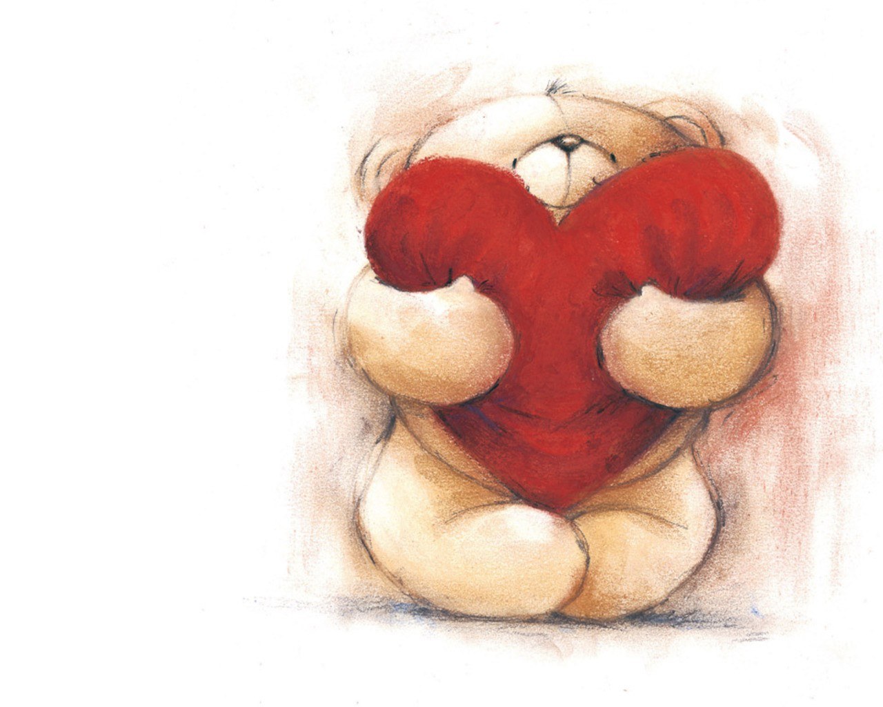 teddy bear holding heart