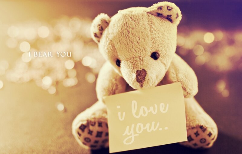 Teddy Bear Holding Note