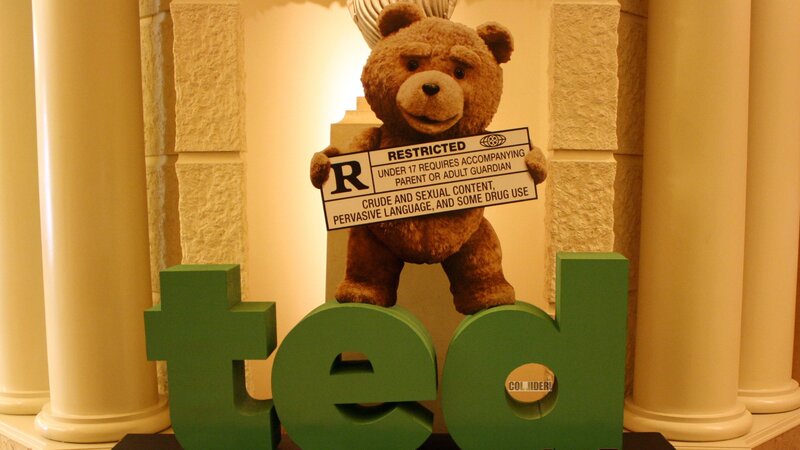 Teddy Bear Holding Sign — Green