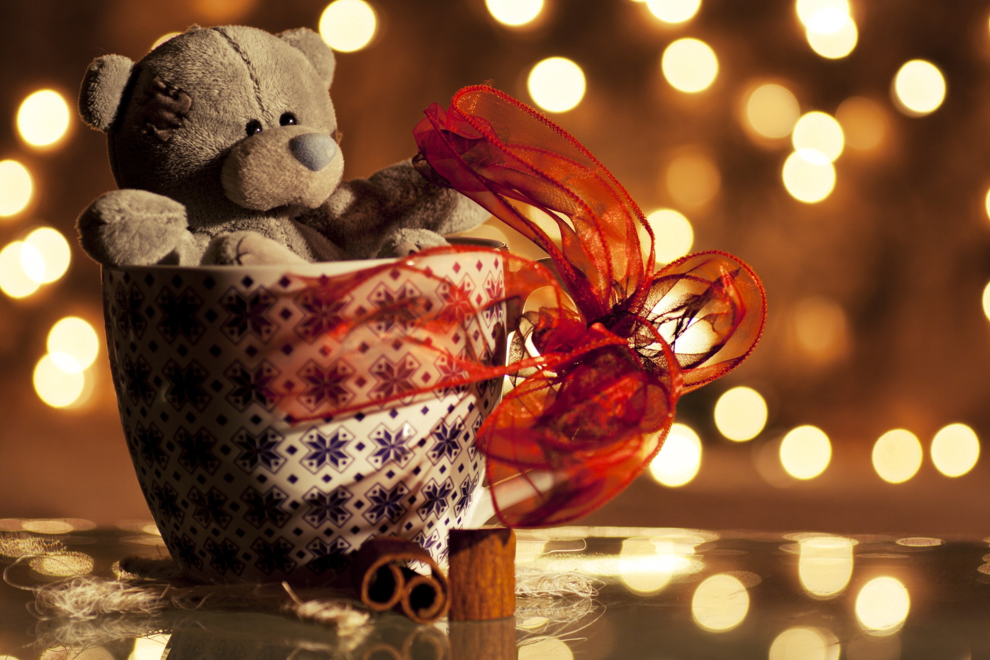 teddy bear in a cup