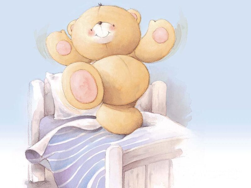 teddy bear in bed