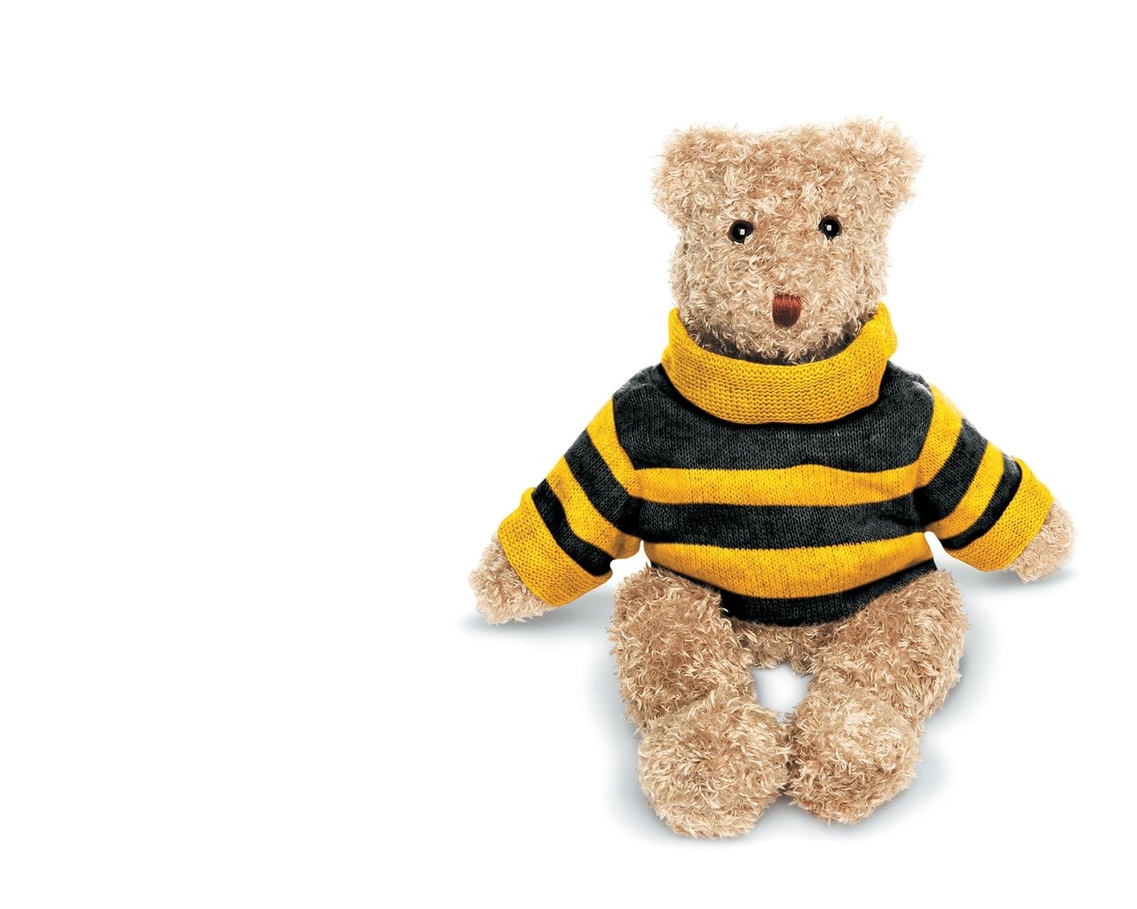 teddy bear in striped sweater