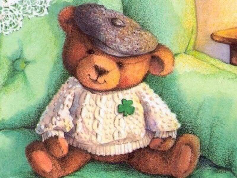 teddy bear in sweater