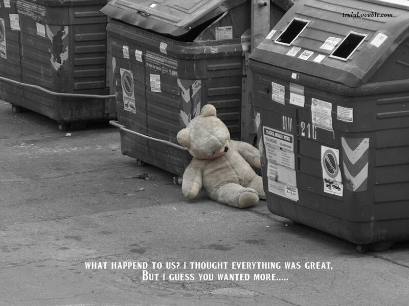Teddy bear in trash