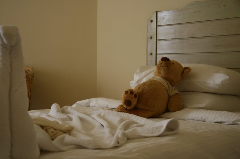 Teddy bear on a bed
