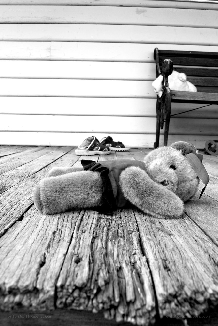 Teddy bear on a porch
