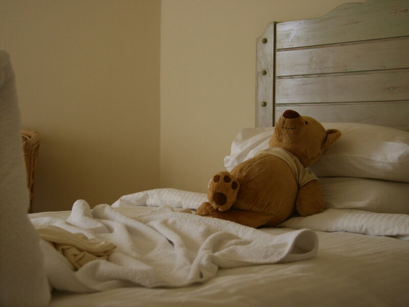 Teddy Bear on Bed — Beige