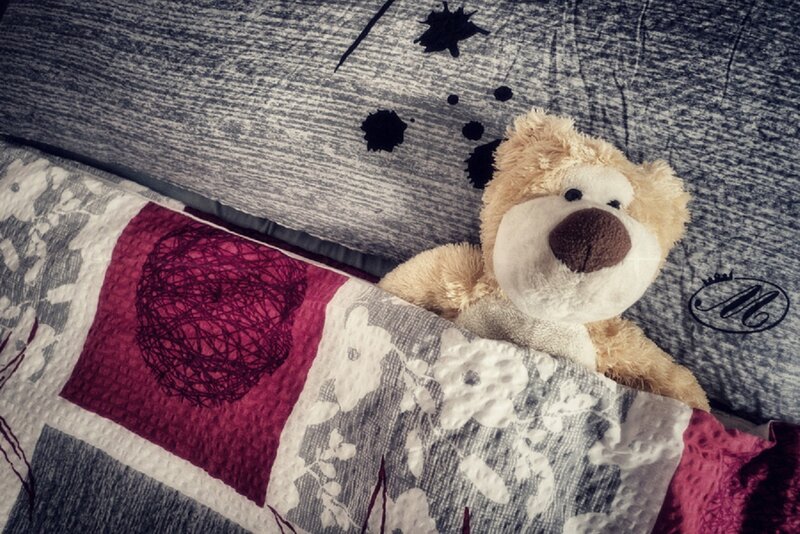 Teddy Bear on Bed — Gray