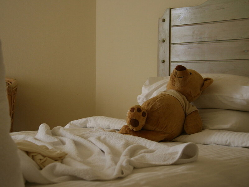 Teddy Bear on Bed — White