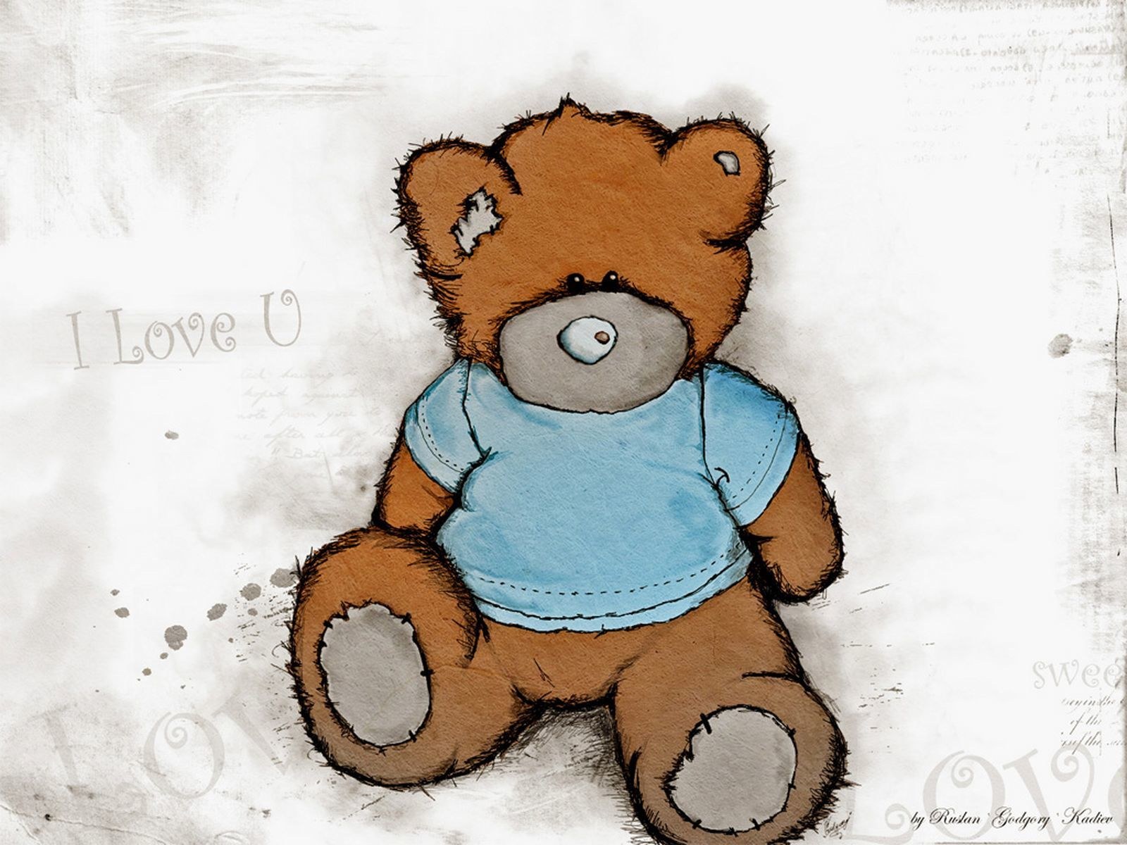 teddy bear with blue shirt