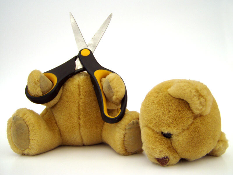 Teddy bear with scissors