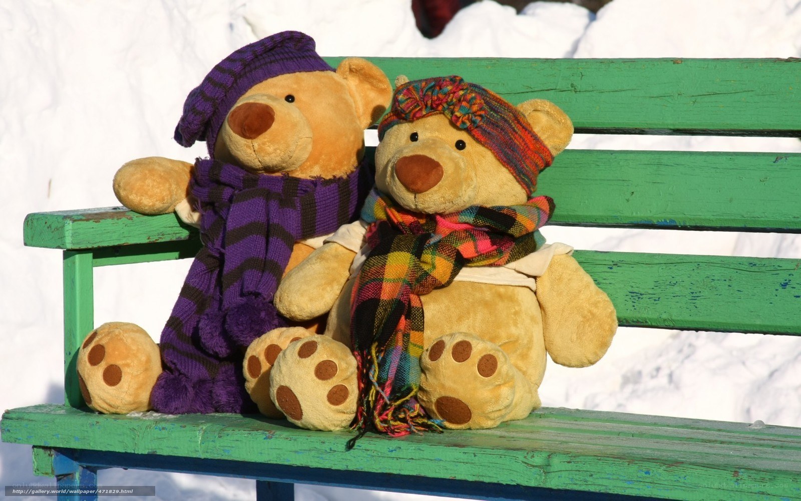 Teddy bears on a bench