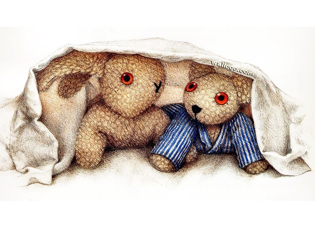 teddy bears under blanket