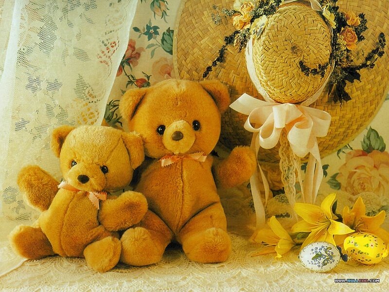 Teddy bears with flowers and hat