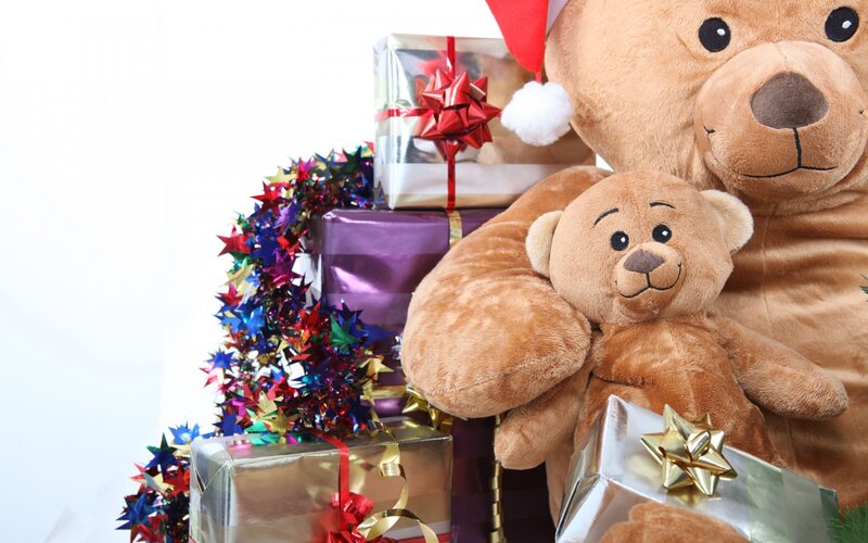 teddy bears with holiday gifts