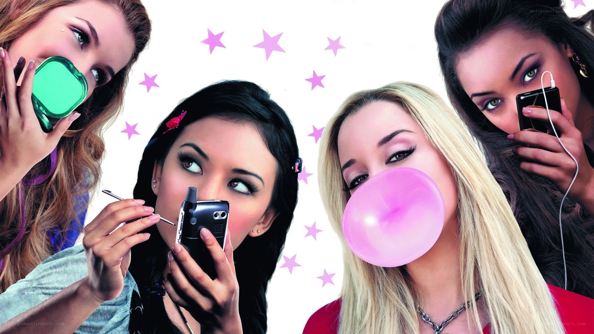 teen girls with phones and bubble gum