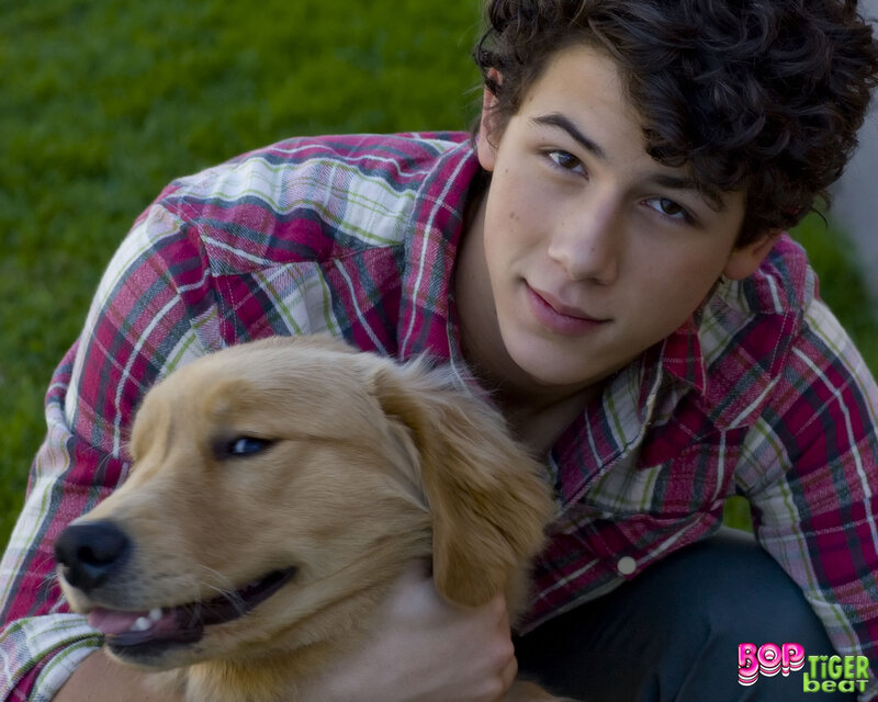 teen with golden retriever