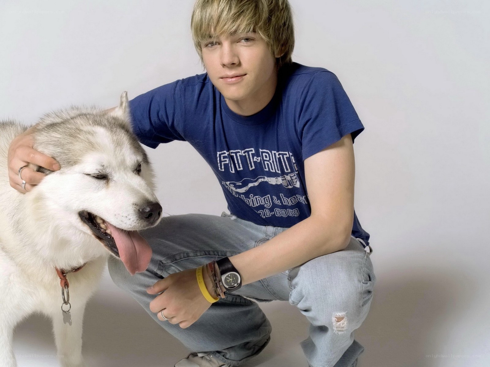 teen with husky dog