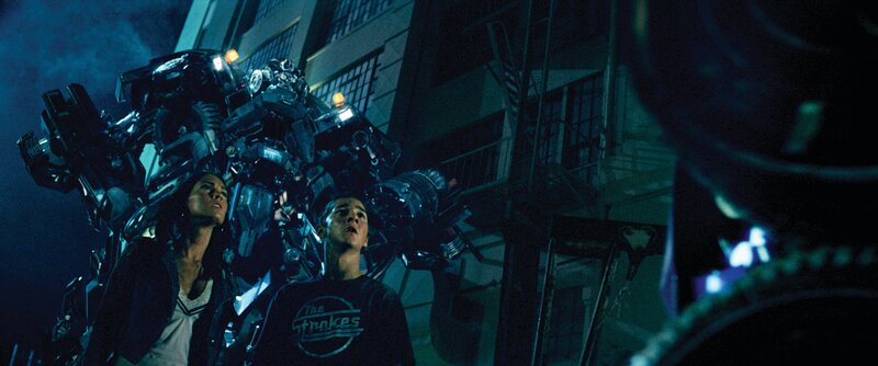 Teenagers face giant robot