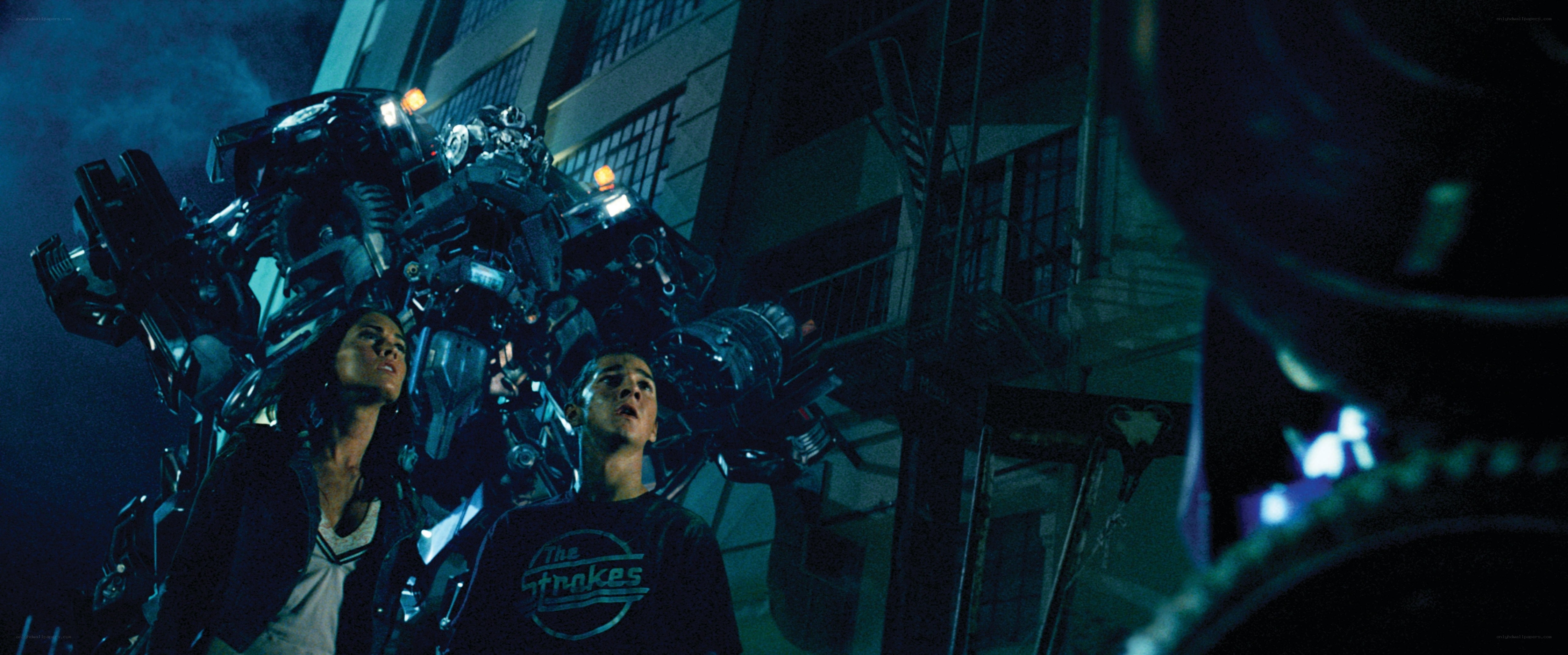 Teenagers face giant robot