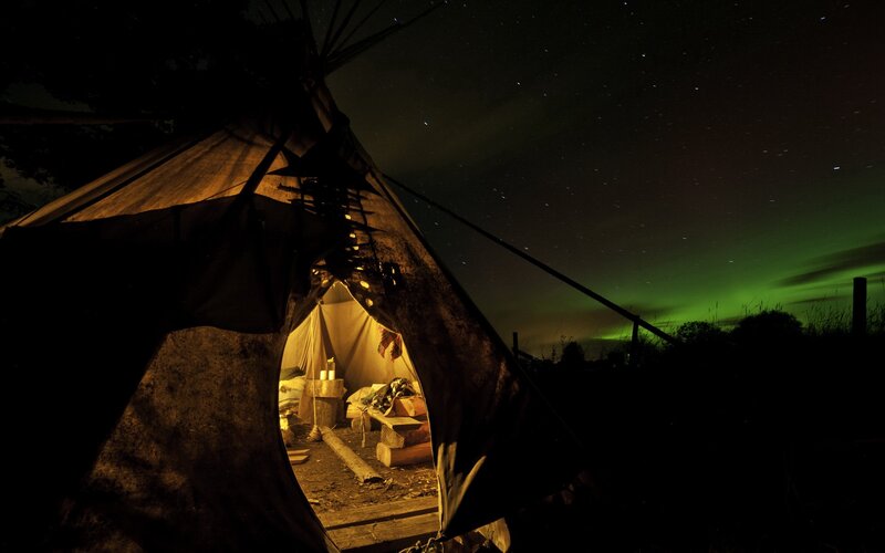 Teepee under northern lights