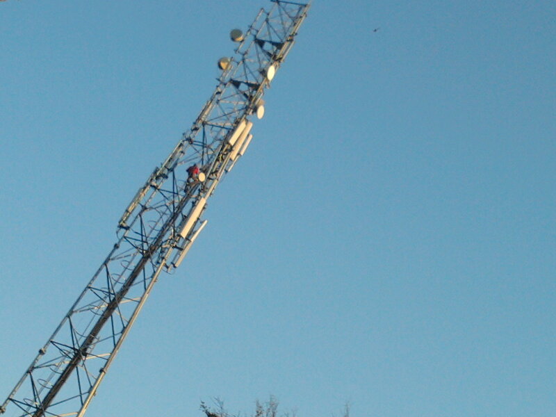 Telecom Tower with Worker