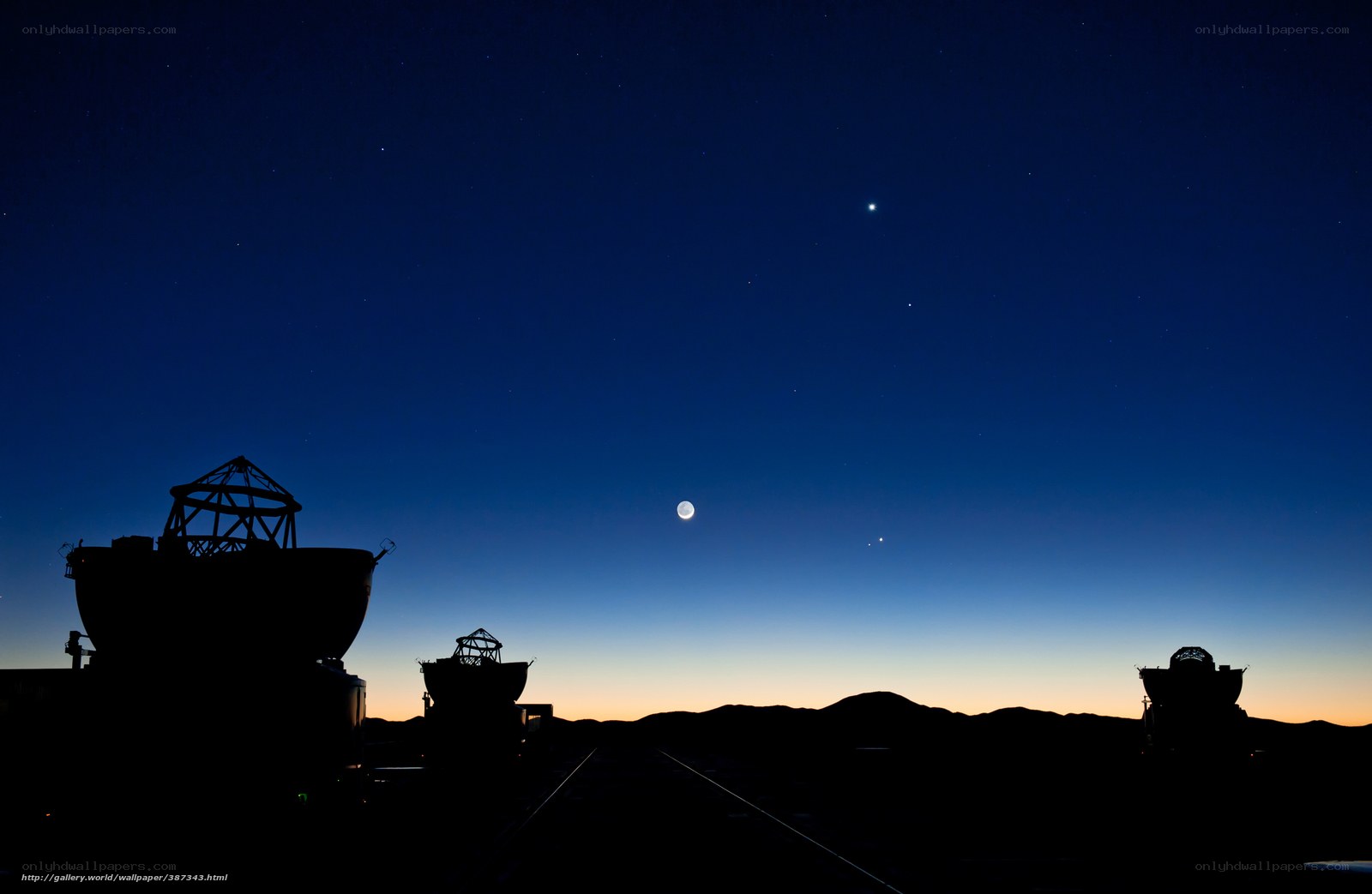 Telescopes under a starry sky