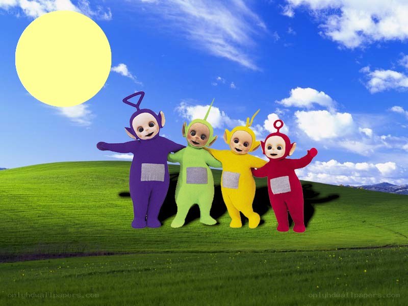 Teletubbies on a green hill