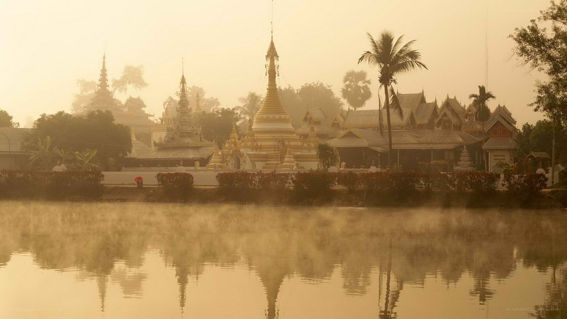 Temple at dawn with mist