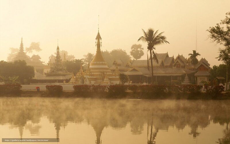 Temple at dawn with mist