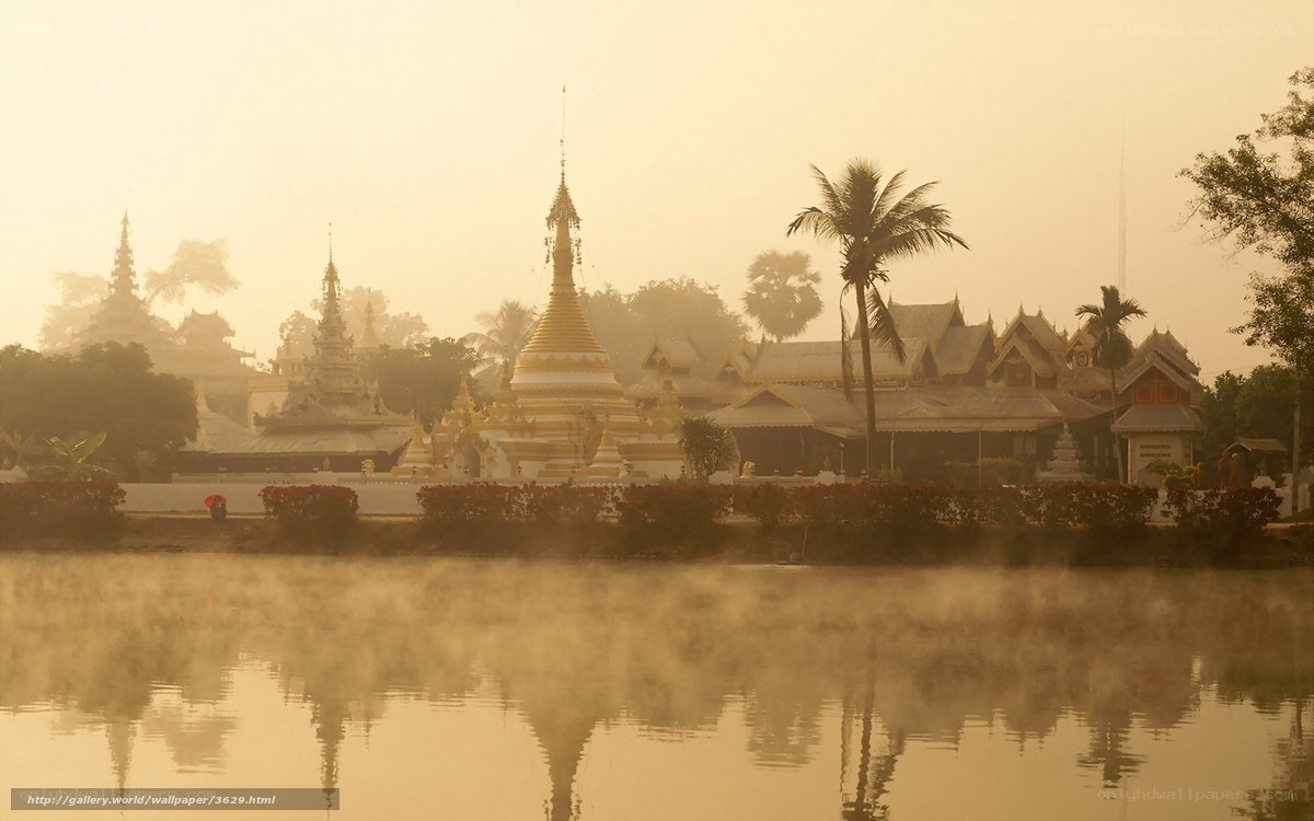 Temple at dawn with mist