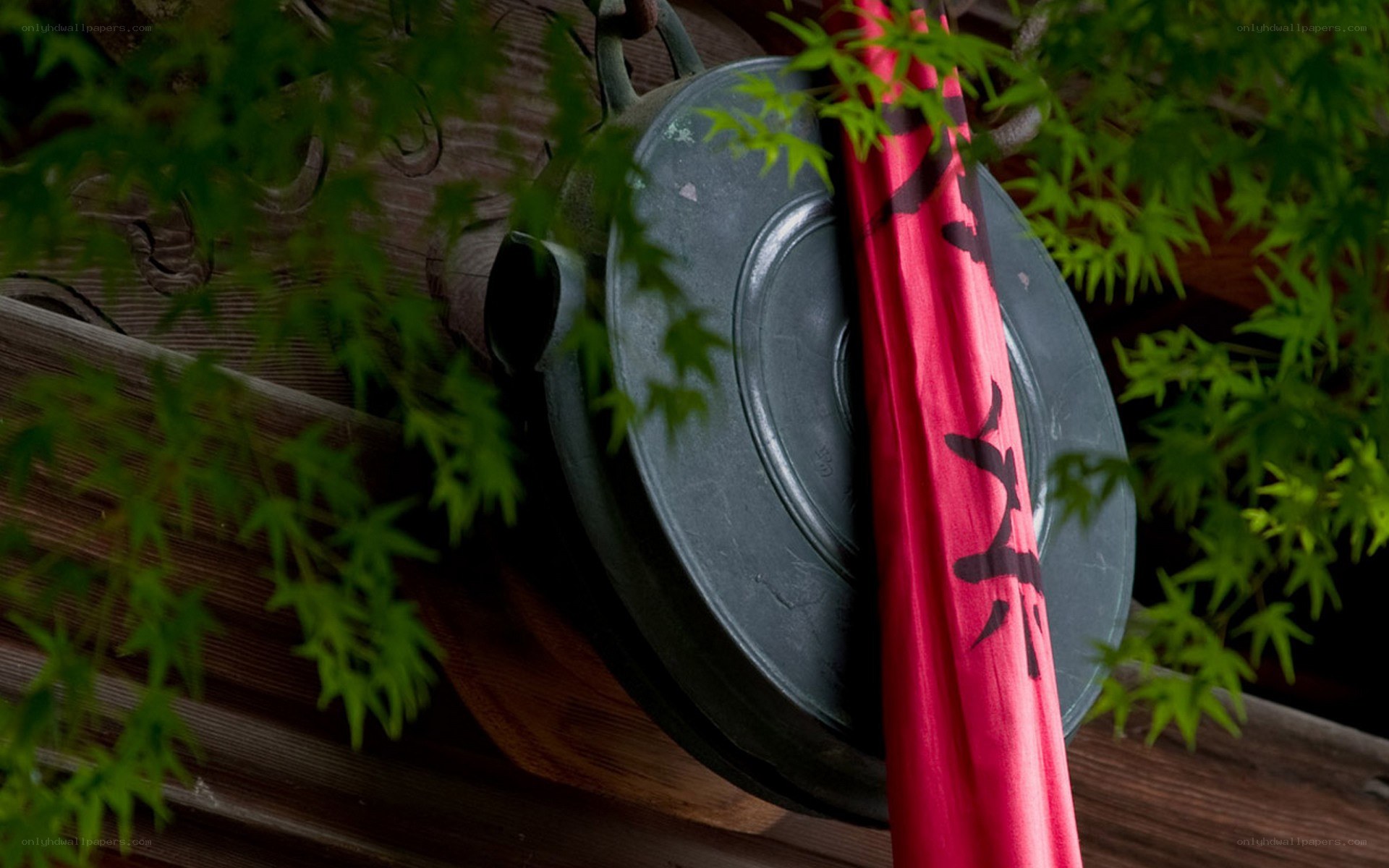 Temple bell with red banner