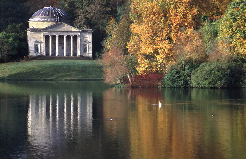 Temple by a lake in autumn