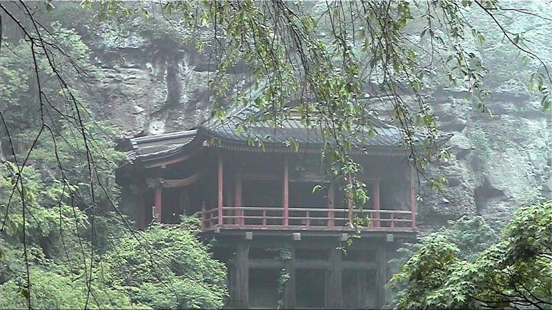 Temple in a misty forest