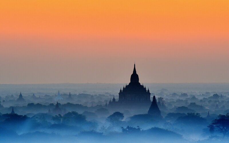 Temple in Misty Landscape
