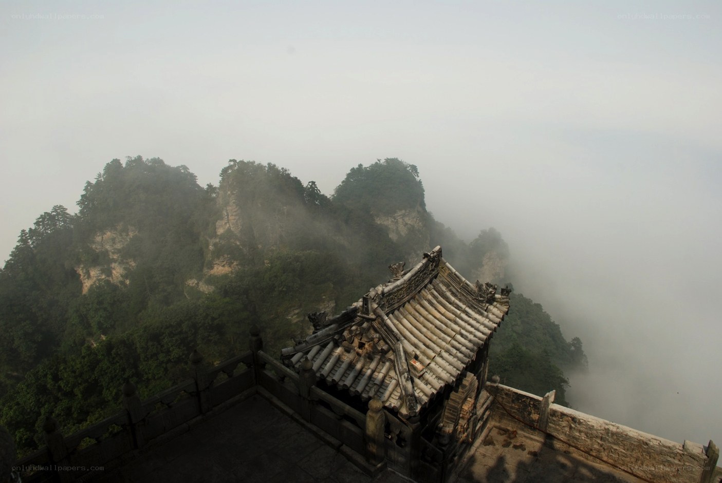 Temple on a misty mountain