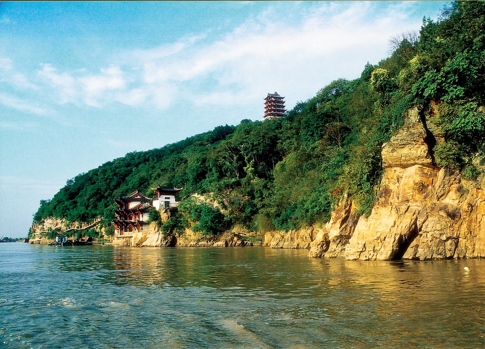 Temple on a riverbank hill