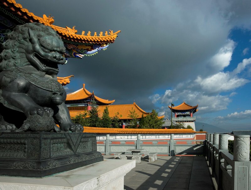 Temple with guardian lion statue